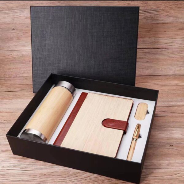 IMG_20241125_100307_043.jpg Bottle, notepad, flash drive, pen (all real bamboo)